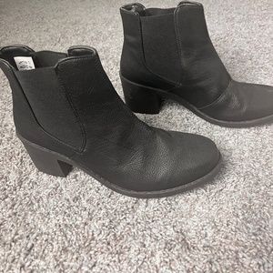 Black heeled leather booties